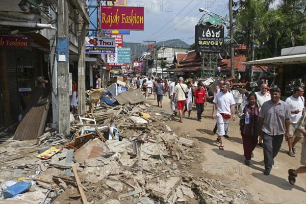 THAILAND, Phang Nga District, Phuket, "Tsunami  carnage the day after. What is left of Patong on the beach road. Patong is the busiest part of Phuket with hotels, bars, and shops in a very tightly condensed area, and being peak season had thousands of tourists in the area. On the 27th Dec. "