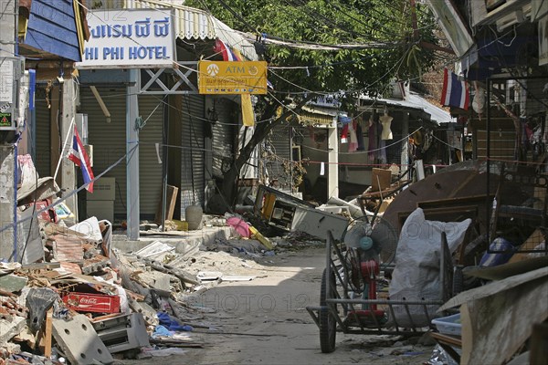 THAILAND, Koh Phi Phi, "Phi Phi on the 11th day after the tsunami hit, shattered shops restuarants and hotels litter the island. On the 6th Jan."
