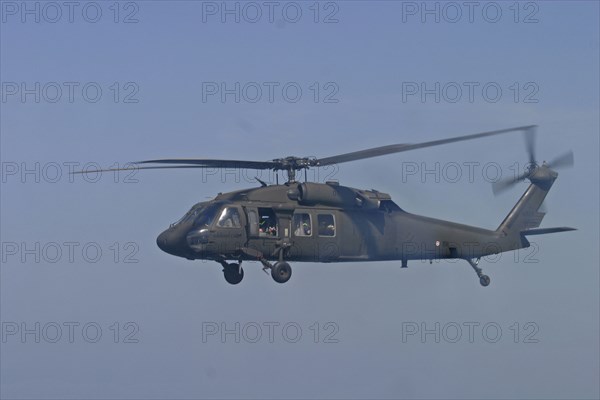 THAILAND, Phuket, "Tsunami. A helicopter in flight with rescue workers are flown from Phuket to look for missing victims in Phangng, north of Phuket. On the 31st Dec."