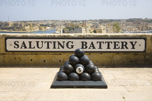 MALTA, Valletta, "Cannonballs, Saluting Battery sign, Saluting Battery, Upper Barracca Gardens, and Grand Harbour,"