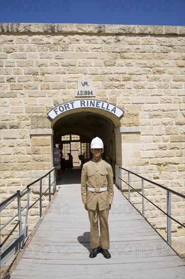 MALTA, Kalkara, Soldier standing outside entrance to Fort Rinella