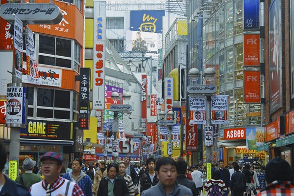 JAPAN, Honshu, Tokyo, "Shibuya, Center Gai, main shopping area, Sunday crowds and multitude of shop signs. "