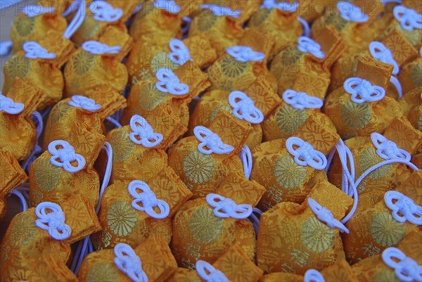 JAPAN, Honshu, Tokyo, "Jingumae - at Meijijingu shrine, omamori good luck charms on display"