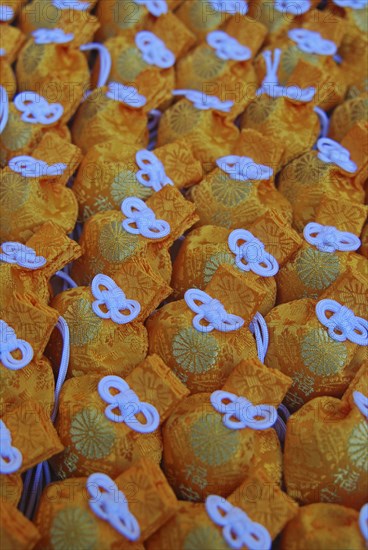 JAPAN, Honshu, Tokyo, "Jingumae - at Meijijingu shrine, omamori good luck charms on display"