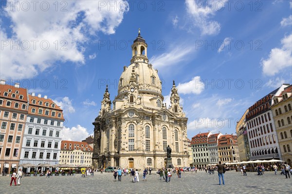 GERMANY, Saxony, Dresden, The restored Baroque church of Frauenkirch and surrounding restored buildings in Neumarkt busy with tourists.