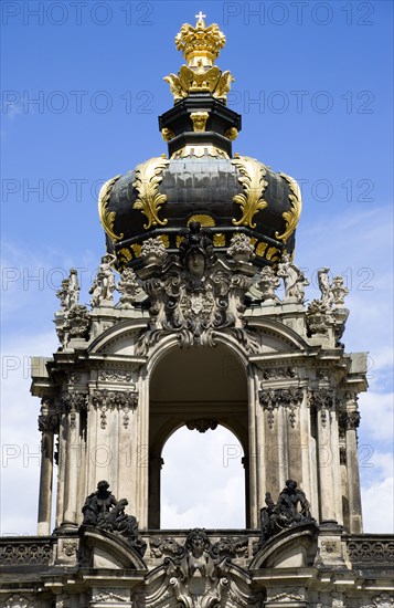 GERMANY, Saxony, Dresden, The Crown Gate or Kronentor of the restored Baroque Zwinger Palace originally built between 1710 and 1732 after a design by Matthus Daniel Pppelmann in collaboration with sculptor Balthasar Permoser.