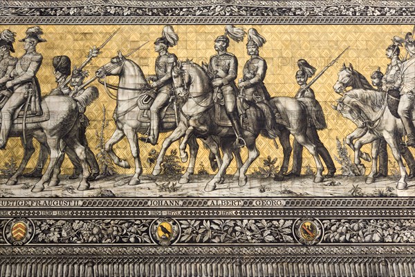 GERMANY, Saxony, Dresden, "Frstenzug or Procession of the Dukes in Auguststrasse a mural on 25,000 Meissen tiles that depicts 35 noblemen from the 12th century Konrad the Great, to Friedrich August III, Saxony's last king, who ruled from 1904-1918. It was originally painted by Wilhelm Walter between 1870 and 1876 but eventually, the stucco began to crumble and around 1906-'07 it was replaced by the tiles."