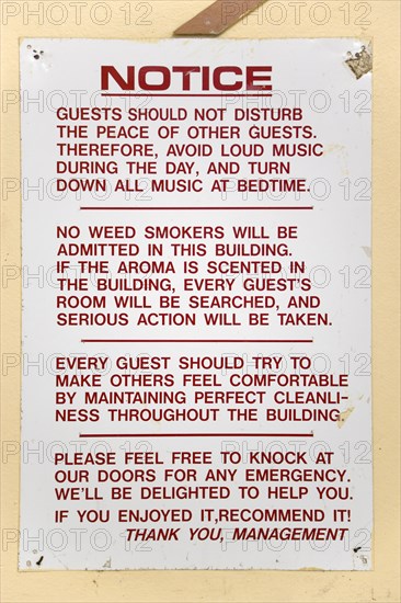 WEST INDIES, Grenada, Carriacou, Hillsborough Notice from the management on the wall of a hotel asking that guests not disturb other guests with loud music or the smoking of cannabis weed.