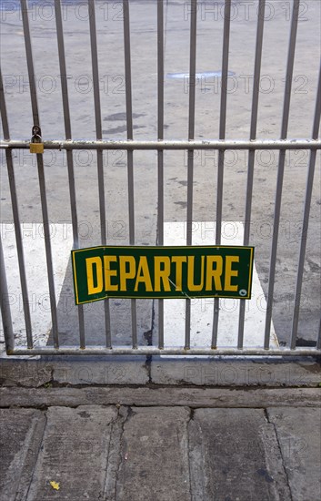 WEST INDIES, St Vincent & The Grenadines, Kingstown, Closed and padlocked gate to Departure area for inter island ferries at the docks.