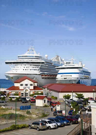 WEST INDIES, Grenada, St George, The cruise ship liners Caribbean Princess and Aida Aura docked at the Cruise Ship Terminal in the capital St Georges.