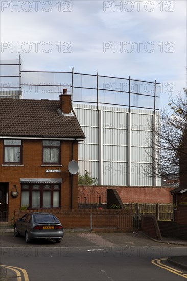 IRELAND, North, Belfast, "West, Falls Road, Peace Line barrier between the Catholic Lower Falls and Protestant Shankill areas."