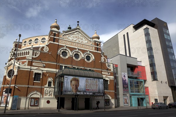 IRELAND, North, Belfast, "Great Victoria Street, Exterior of the Grand Opera House with its modern new Extension next to the new Fitzwilliam 5 star hotel."