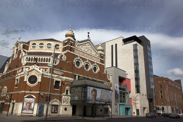 IRELAND, North, Belfast, "Great Victoria Street, Exterior of the Grand Opera House with its new modern extension next to the new Fitzwilliam 5 star hotel"