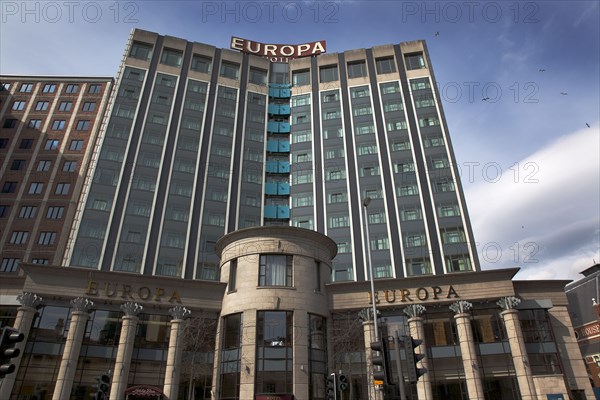 IRELAND, North, Belfast, "Great Victoria Street, Exterior of the Europa hotel, once the most bombed hotel in Europe"