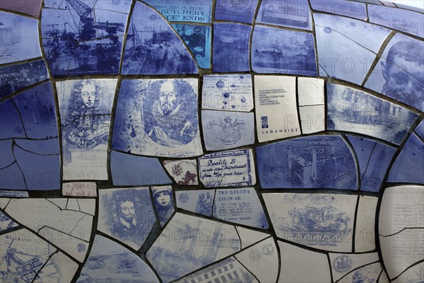 IRELAND, North, Belfast, "Donegall Quay, The Big Fish Sculpture by John Kindness. The scales of the fish are pieces of printed blue tiles with details of Belfasts history. The 10 metre long structure is situated beside the Lagan Weir opposite the old Custom House."