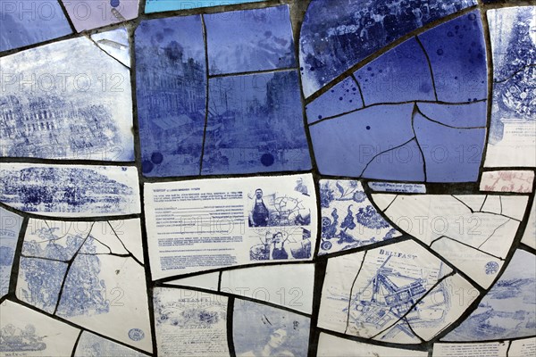 IRELAND, North, Belfast, "Donegall Quay, The Big Fish Sculpture by John Kindness. The scales of the fish are pieces of printed blue tiles with details of Belfasts history. The 10 metre long structure is situated beside the Lagan Weir opposite the old Custom House"