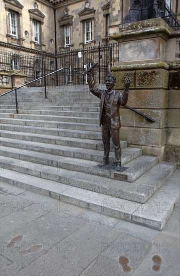 IRELAND, North, Belfast, "Custom House Square, Bronze statue of The Speaker on the steps. The site was originally used as a Speakers Corner"