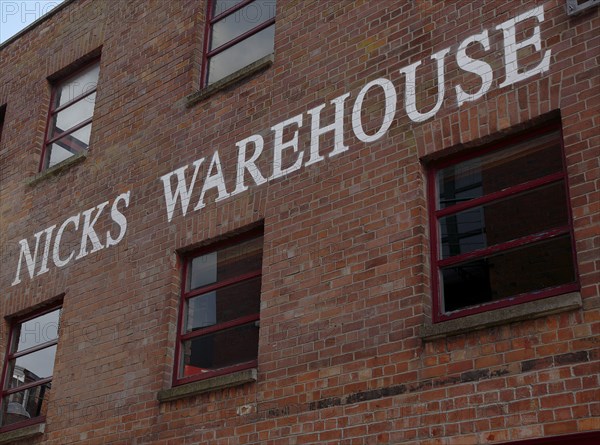 IRELAND, North, Belfast, "Cathedral Quarter, Hill Street, Nicks Warehouse a former bonded warehouse for Bushmills whiskey now a restaurant and wine bar."