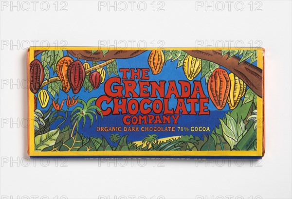 WEST INDIES, Grenada, St Patrick, Bar of 71% percent cocoa organic dark chocolate form The Grenada Chocolate Company in colourful wrapper.