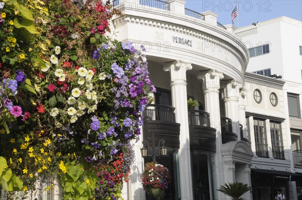 USA, California, Los Angeles, "Rodeo Drive. Flower basket & shops, Two Rodeo shopping alley"