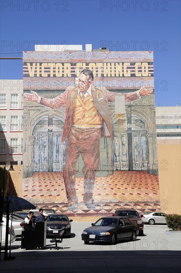 USA, California, Los Angeles, "Mural depicting clothing history downtown, fashion district. Valet parking lot below."
