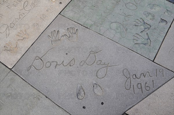 USA, California, Los Angeles, "Doris Day's tiny footprint, Mann's Chinese Theatre, Hollywood. Grauman"