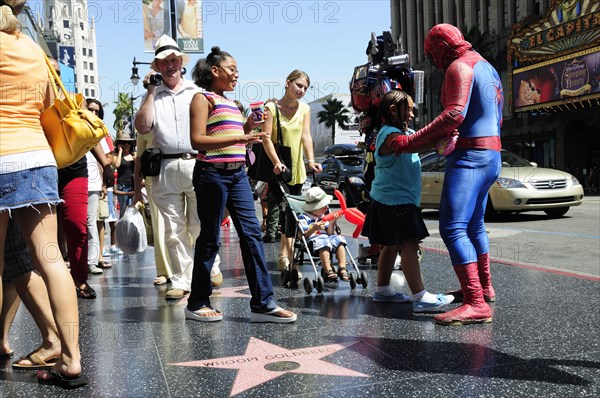 USA, California, Los Angeles, Action heroes along Hollywood Boulevard