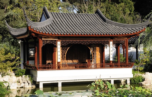 USA, California, Los Angeles, "View across lake to the Lotus Pavilion, Chinese Garden, The Huntington, Pasadena"