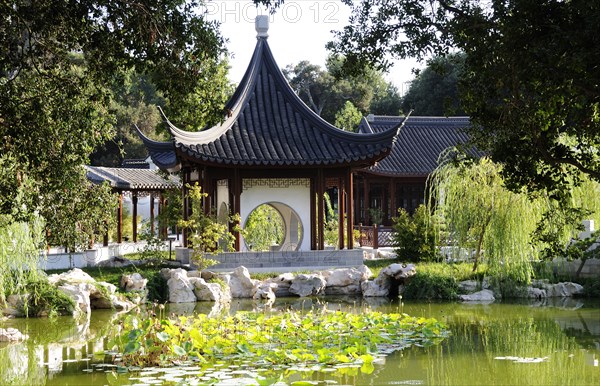 USA, California, Los Angeles, "View across lake to Terrace of the Jade Mirror, Chinese Garden, The Huntington, Pasadena"