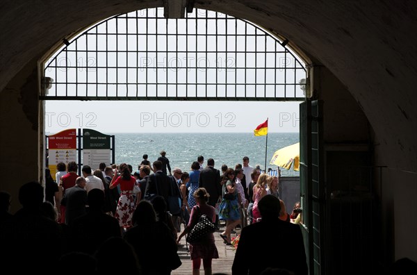 ENGLAND, East Sussex, Brighton, "Kings Road Promenade, Underpass exiting onto seafront."