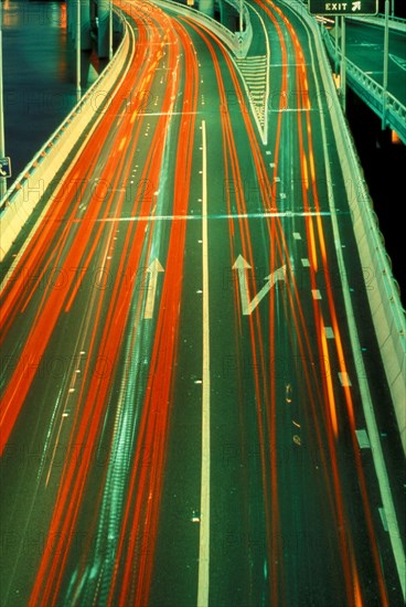 TRANSPORT, Road, Cars, Red and yellow blurred light trails from night time traffic.