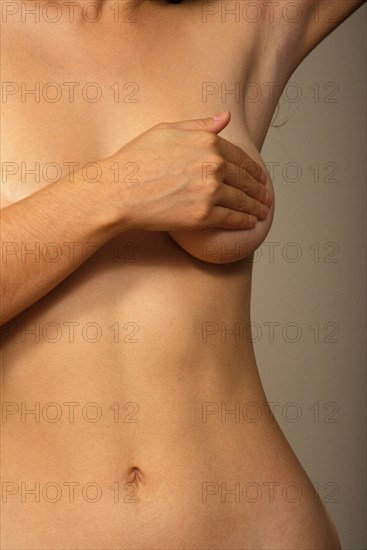 PEOPLE, Women, Health, Cropped shot of woman self examining her breast tissue.