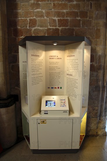 ENGLAND, West Sussex, Chichester, "Cathedral Interior, Multi Lingual Donorpoint Machine for accepting credit or debit card donations."