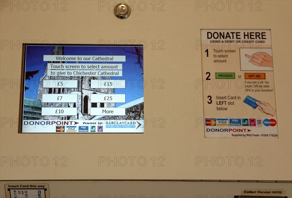 ENGLAND, West Sussex, Chichester, "Cathedral Interior, Multi Lingual Donorpoint Machine for accepting credit or debit card donations."