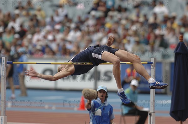 SPORT, Athletics, High Jump, "High Jumper doing the Fosbury Flop. Melbourne 2006 Commonwealth Games, Australia."