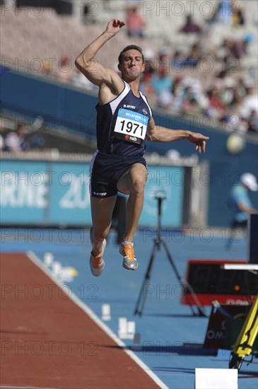 SPORT, Athletics, Long Jump, "Scotland's Darren Ritchie during the long Jump in mid leap. 2006 Commonwealth Games Melbourne, Australia."