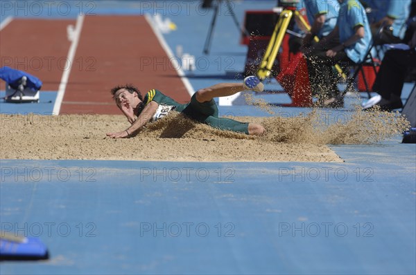 SPORT, Athletics, Long Jump, "Australian John Thornell during the Long Jump landing in the sand. 2006 Commonwealth Games, Melbourne, Australia."