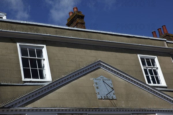 ENGLAND, East Sussex, Lewes, "Cliffe High Street, Sundial on building."