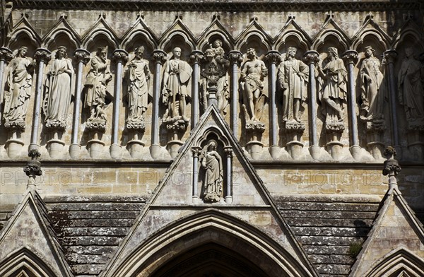 ENGLAND, Wiltshire, Salisbury, "Cathedral, Stone statues of Saints above the entrance."