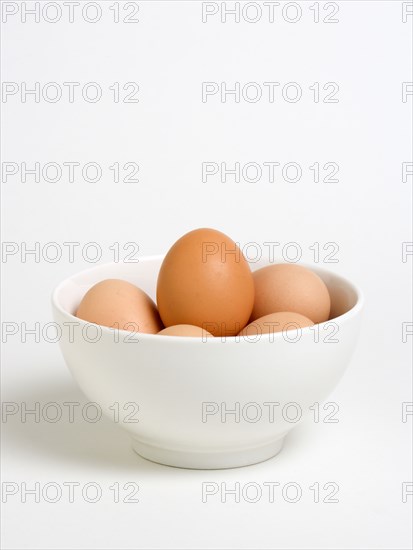 FOOD, Uncooked, Eggs, Free range eggs in a bowl on a white background.