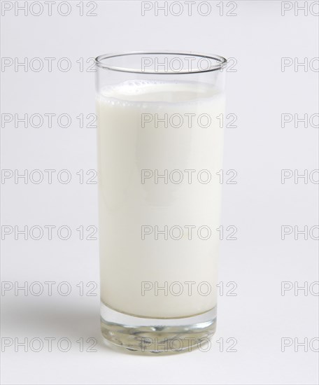 DRINK, Milk, Glass, Tumbler glass of dairy milk on a white background.