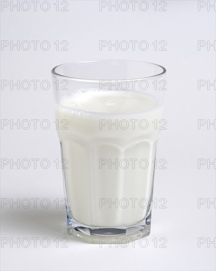 DRINK, Milk, Glass, Tumbler glass of dairy milk on a white background.