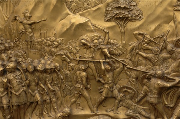 ITALY, Tuscany, Florence, Bronze Doors with Relief Sculptures by Lorenzo Ghiberti  Florence Baptistry  Piazza del Duomo.