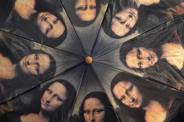 ITALY, Tuscany, Florence, Mona Lisa Umbrella.