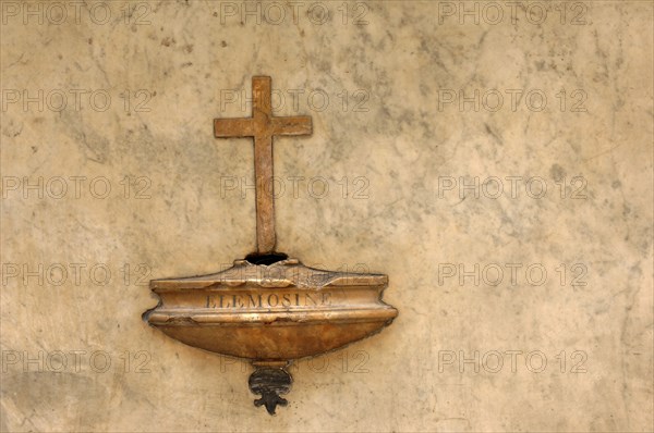 ITALY, Tuscany, Siena, Religious Cross on Wall.