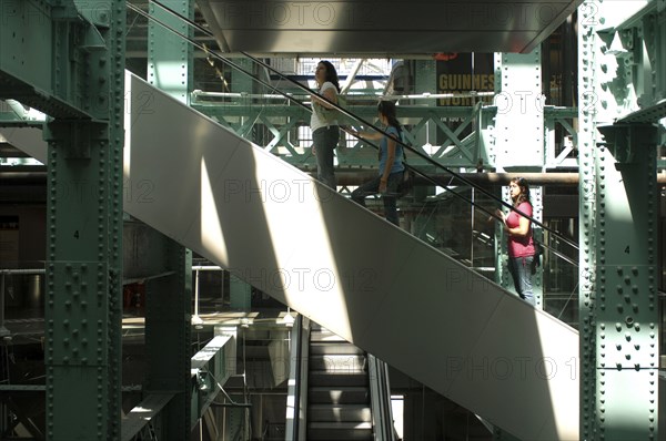 IRELAND, Dublin, Escalators in the Guinness Storehouse.