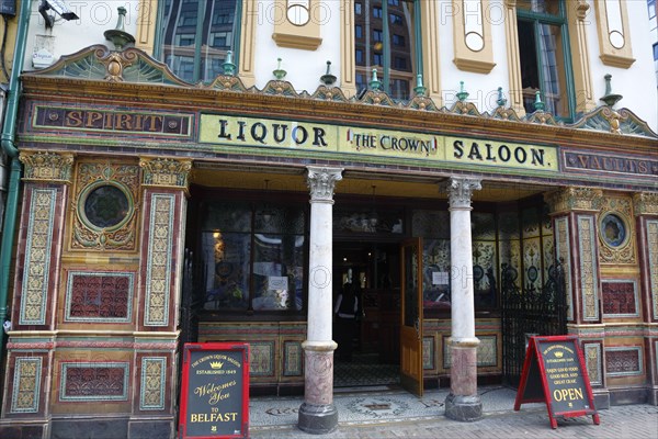 Ireland, North, Belfast, Great Victoria Street, The Crown Bar Liquor Saloon. Built in 1826 it features gas lamps and cosy snugs.