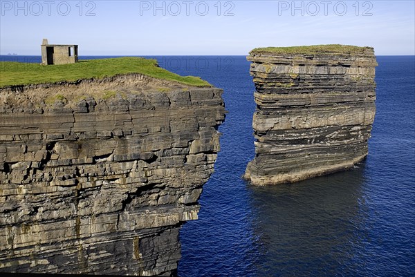 IRELAND, County Mayo, Downpatrick Head, Dún Briste Broken Fort is an impressive sea stack at the headland Standing 50 meters 164 feet high, Dún Briste was once part of the mainland, and connected to it by a sea arch.