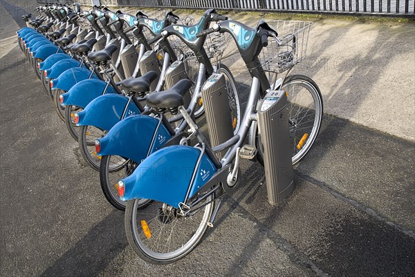 IRELAND, County Dublin, Dublin City, The Rent a Bike scheme, line of bikes ready for hire.