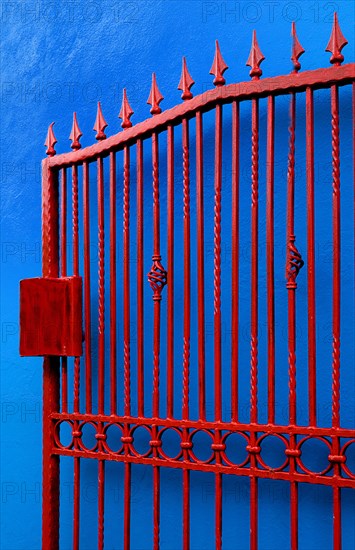 IRELAND, County Cork, Allihies Village, Colourful gate and Wall.